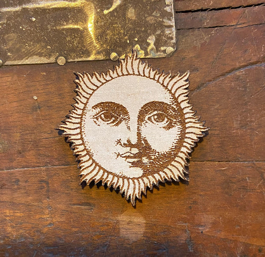 Sun face magnet.