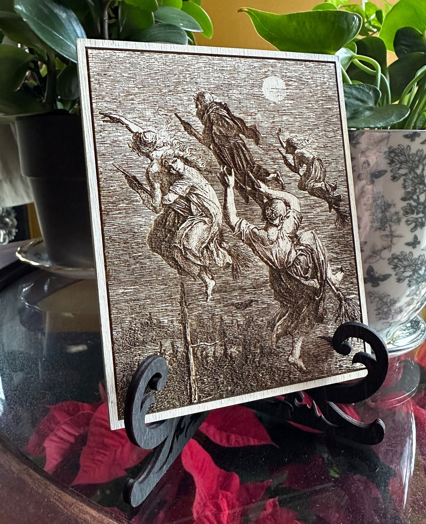 Witches flying engraved plaque.